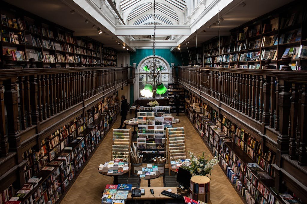Explore the charm of a classic bookstore with stunning balconies and vast book collections.
