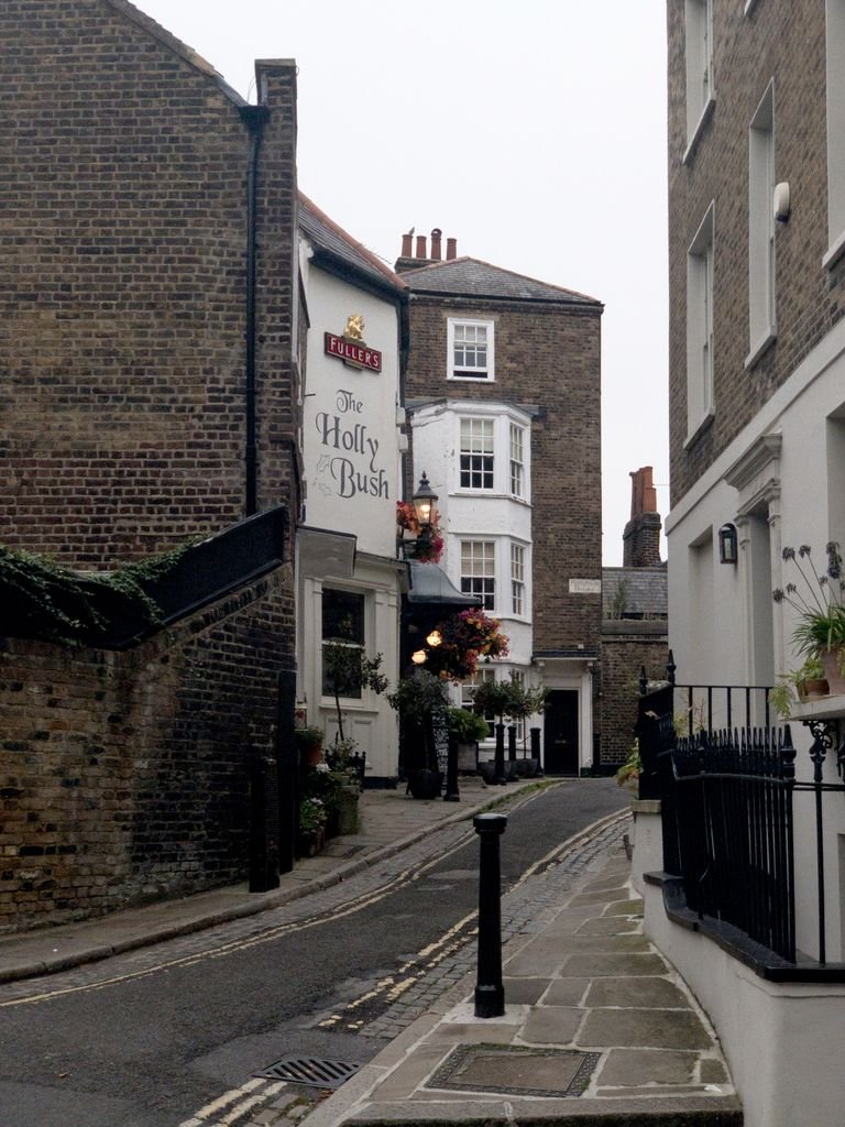 London villages - Cozy narrow street scene in hampstead, featuring traditional architecture and cozy pavement.